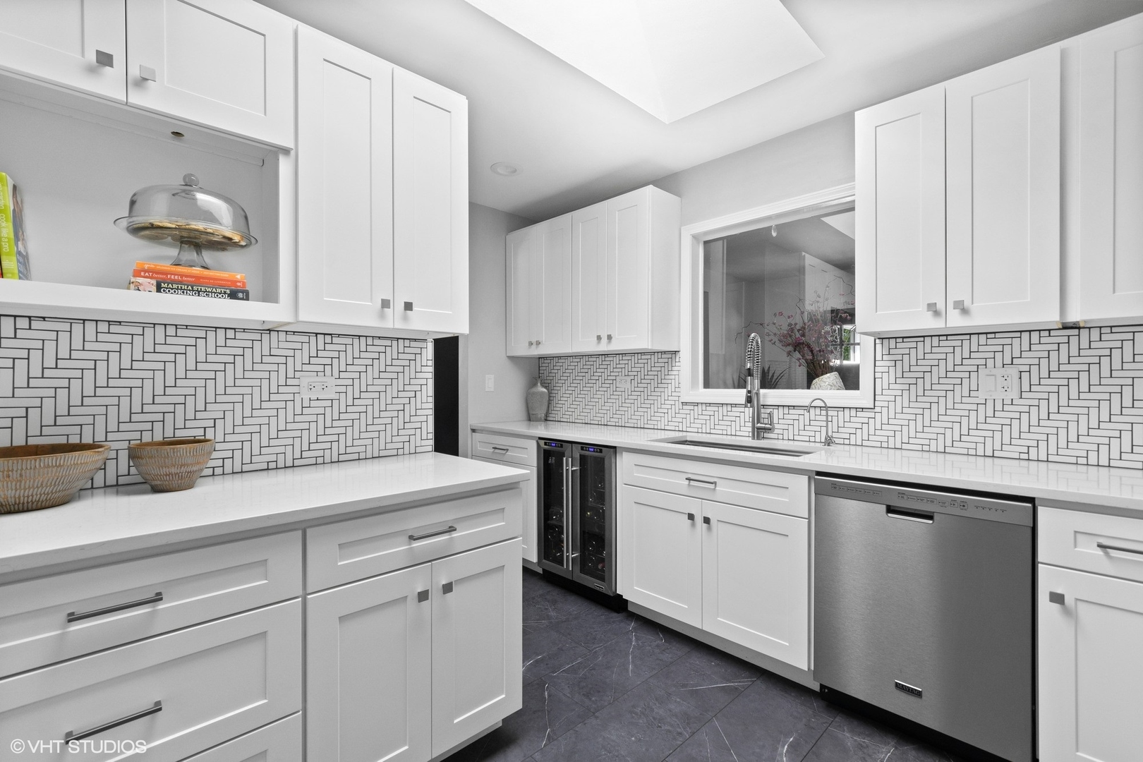 590 Old Elm Road Highland Park, IL 60035 - Photo 9 of 28 a kitchen with white cabinets and sink