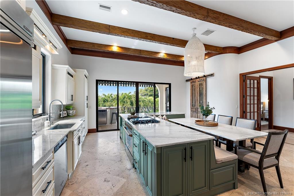 15 Middle Road Sewall's Point, FL 34996 - Photo 31 of 61 a view of a dining room with furniture window and outside view