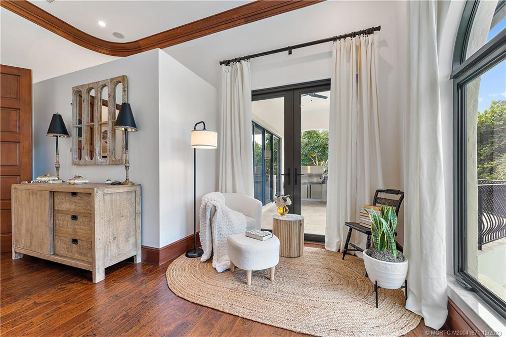 15 Middle Road Sewall's Point, FL 34996 - Photo 37 of 61 a living room with furniture and a large window