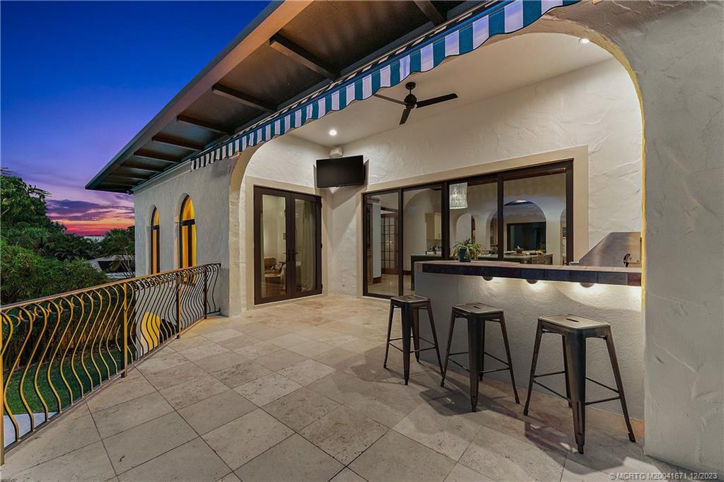 15 Middle Road Sewall's Point, FL 34996 - Photo 55 of 61 a view of a chairs and table in a balcony