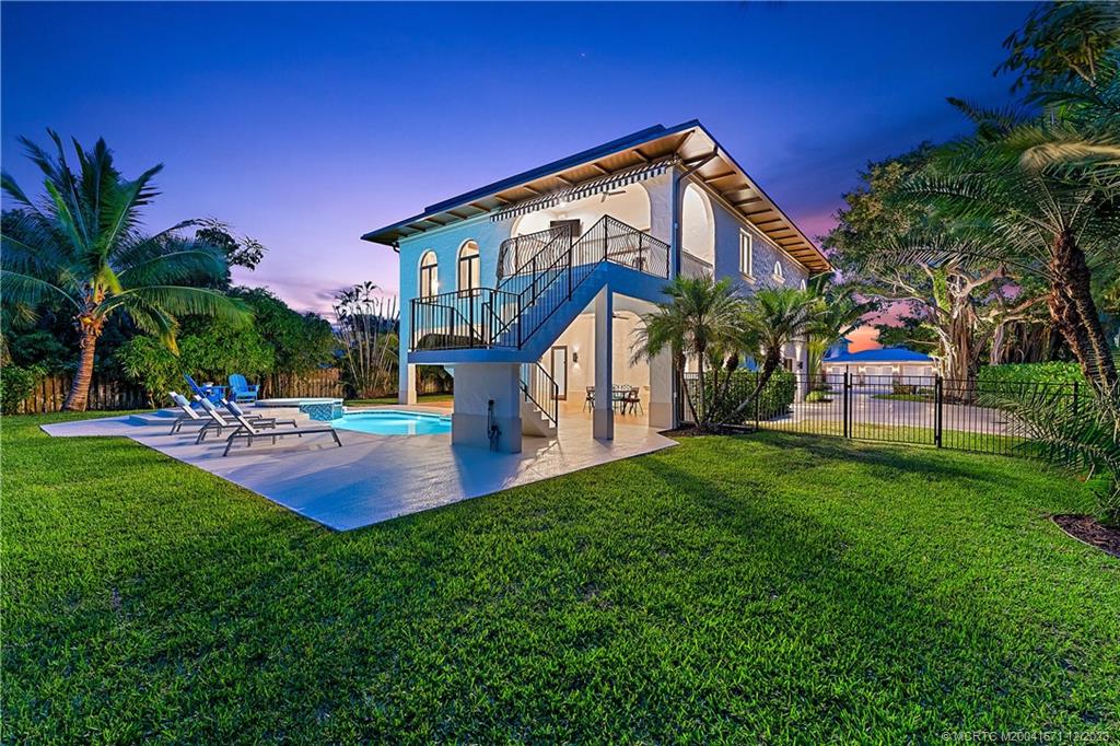 15 Middle Road Sewall's Point, FL 34996 - Photo 60 of 61 a view of a house with a yard