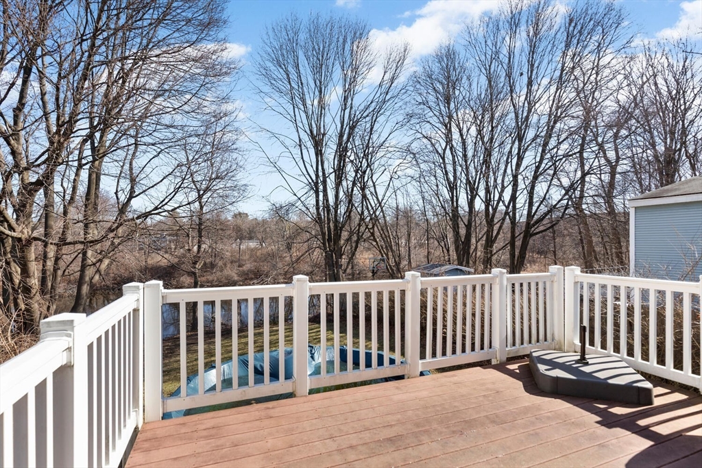 58 Saunders Street North Andover, MA 01845 - Photo 12 of 14 a view of a wooden roof deck