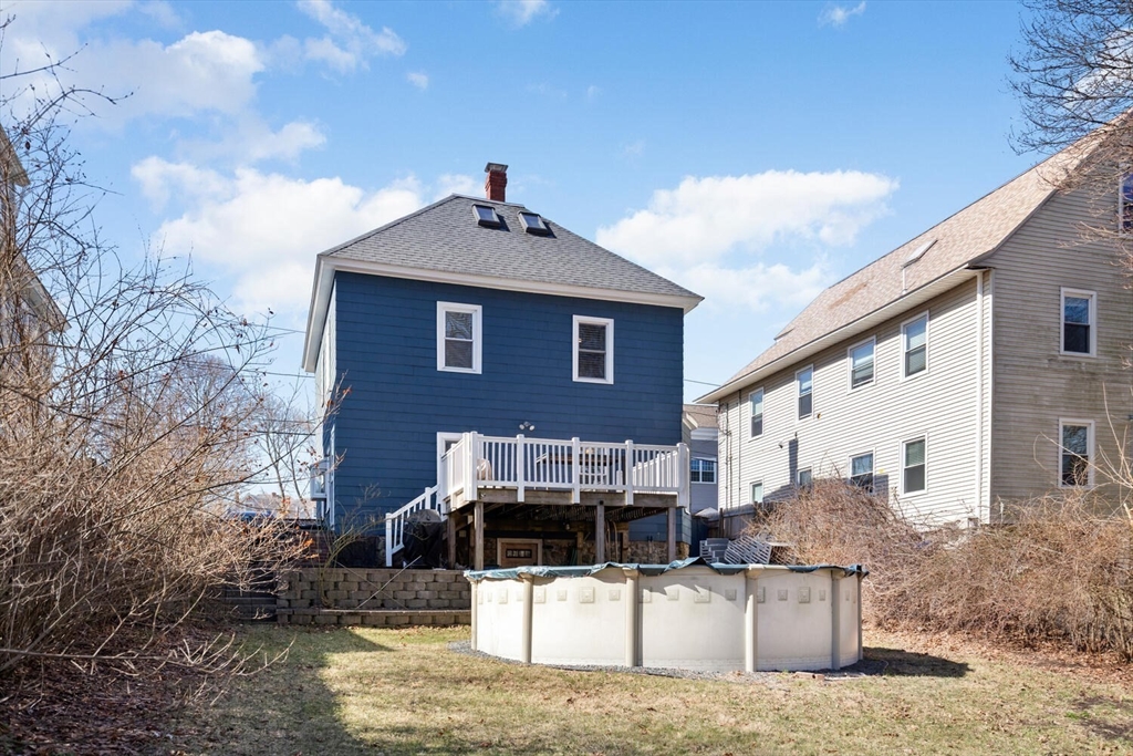 58 Saunders Street North Andover, MA 01845 - Photo 13 of 14 a front view of a house with garage