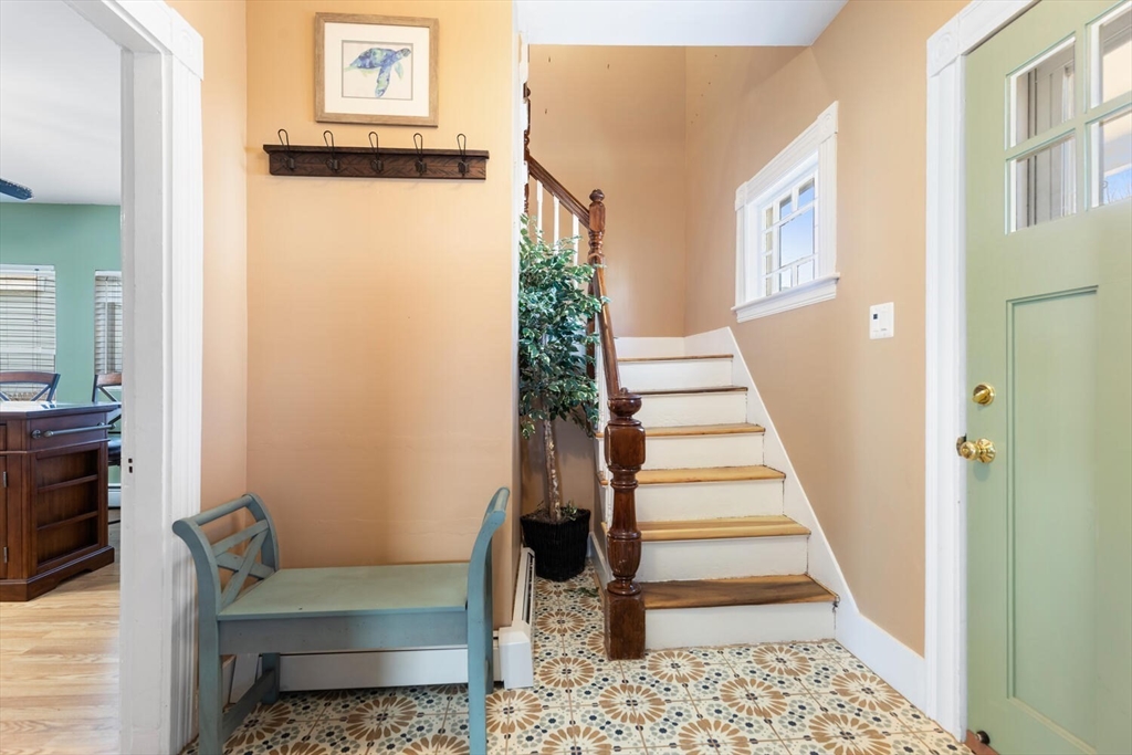 58 Saunders Street North Andover, MA 01845 - Photo 5 of 14 a living room with furniture and a rug