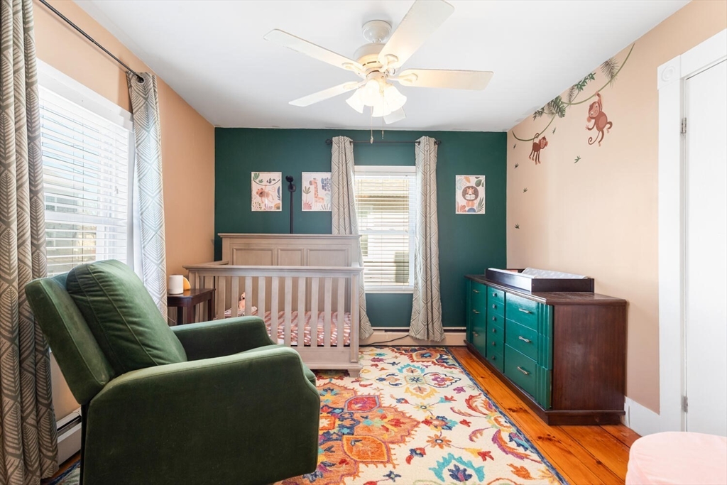 58 Saunders Street North Andover, MA 01845 - Photo 8 of 14 a living room with furniture and a rug