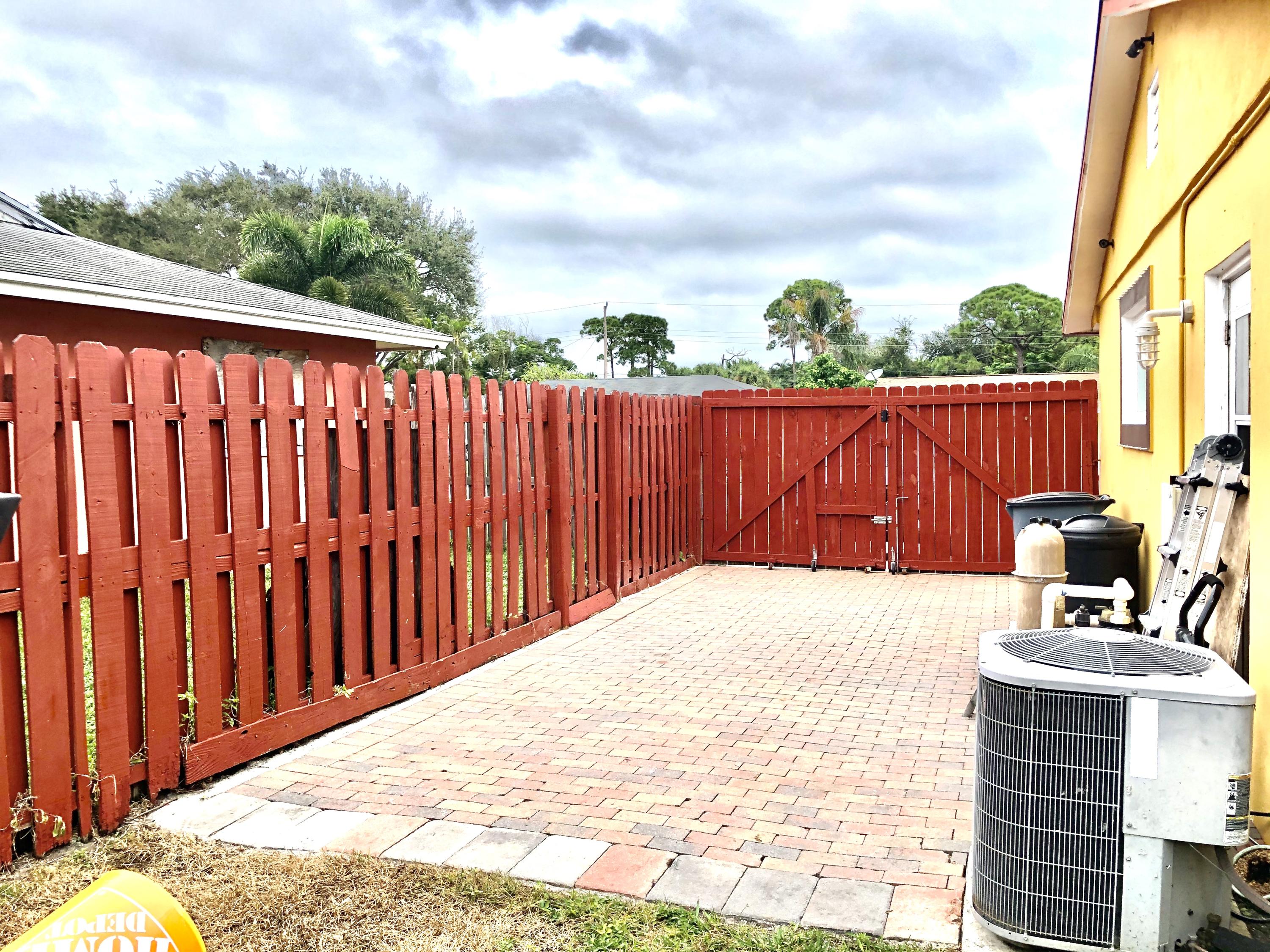 3308 Grove Road Palm Beach Gardens, FL 33410 - Photo 2 of 19 fullsizeoutput_297a
