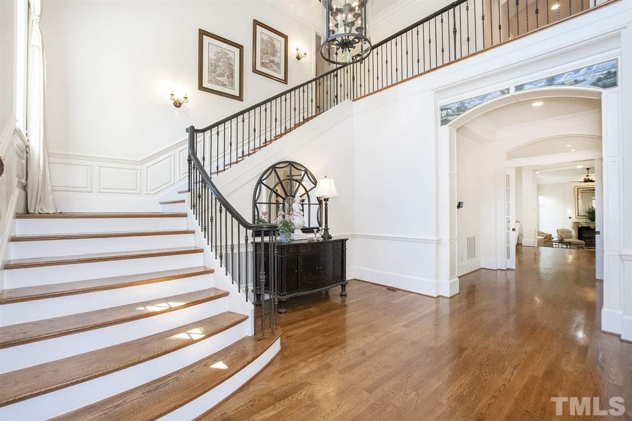 1016 Heydon Court Raleigh, NC 27614 - Photo 2 of 30 a view of entryway and hall with wooden floor