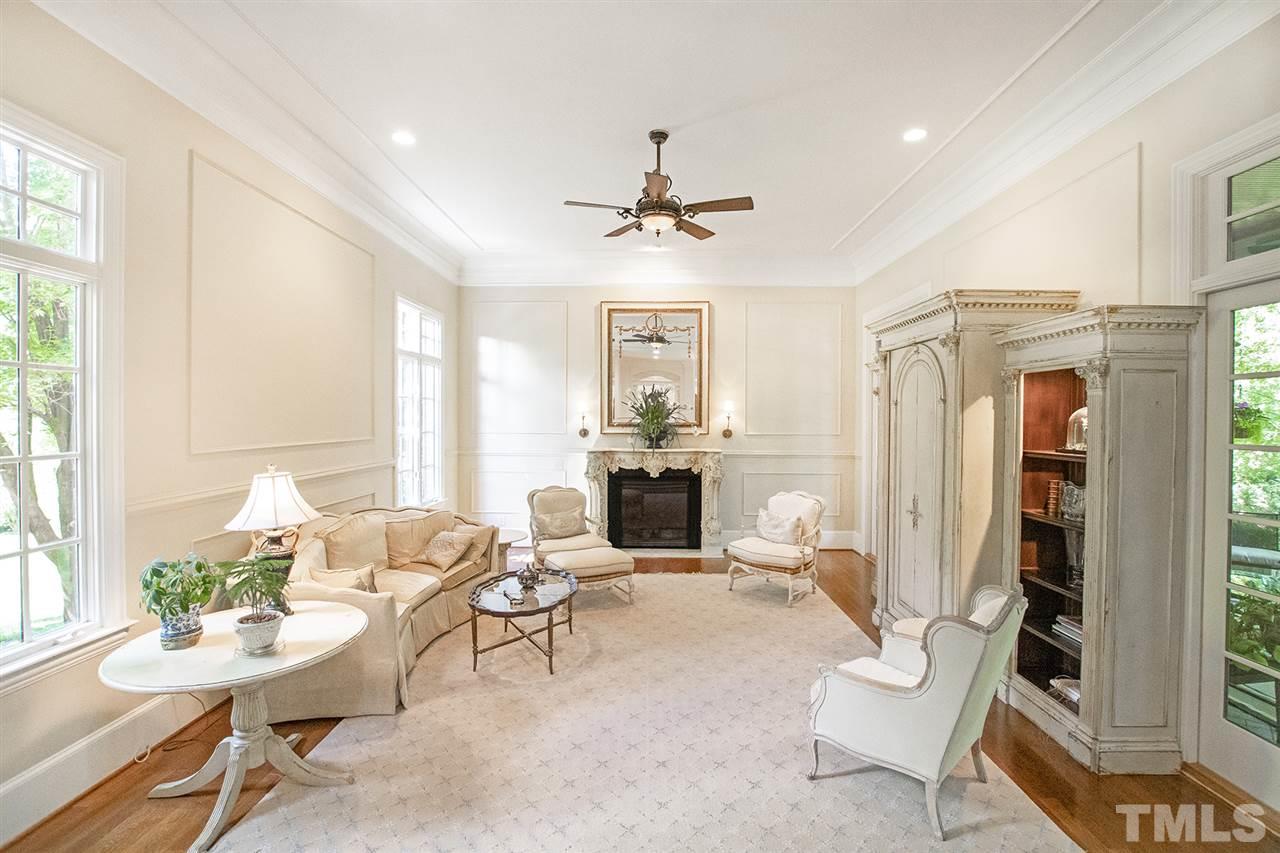 1016 Heydon Court Raleigh, NC 27614 - Photo 12 of 30 a living room with furniture a lamp and a window