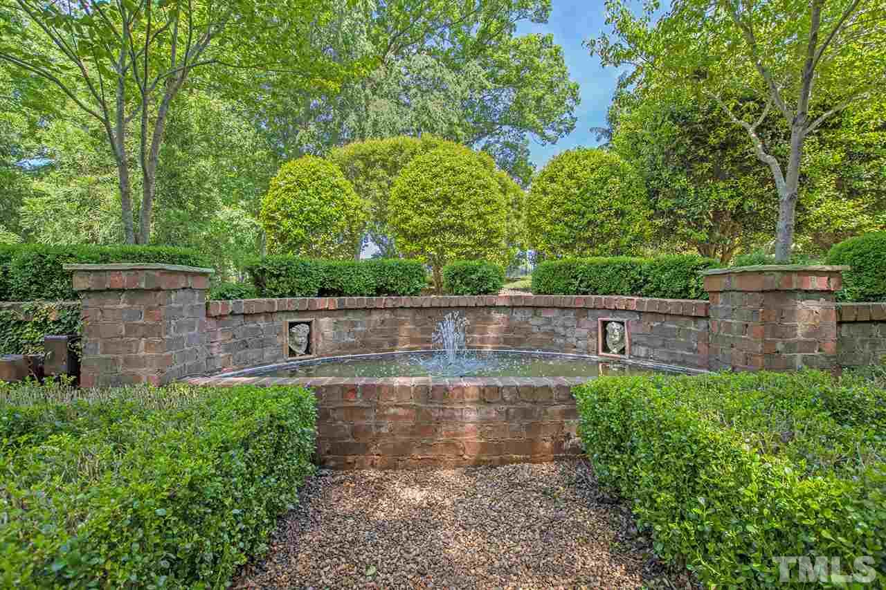 1016 Heydon Court Raleigh, NC 27614 - Photo 16 of 30 a backyard of a house with lots of green space