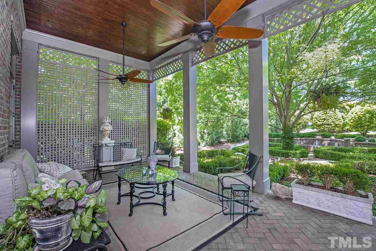 1016 Heydon Court Raleigh, NC 27614 - Photo 19 of 30 a building outdoor space with furniture and garden view