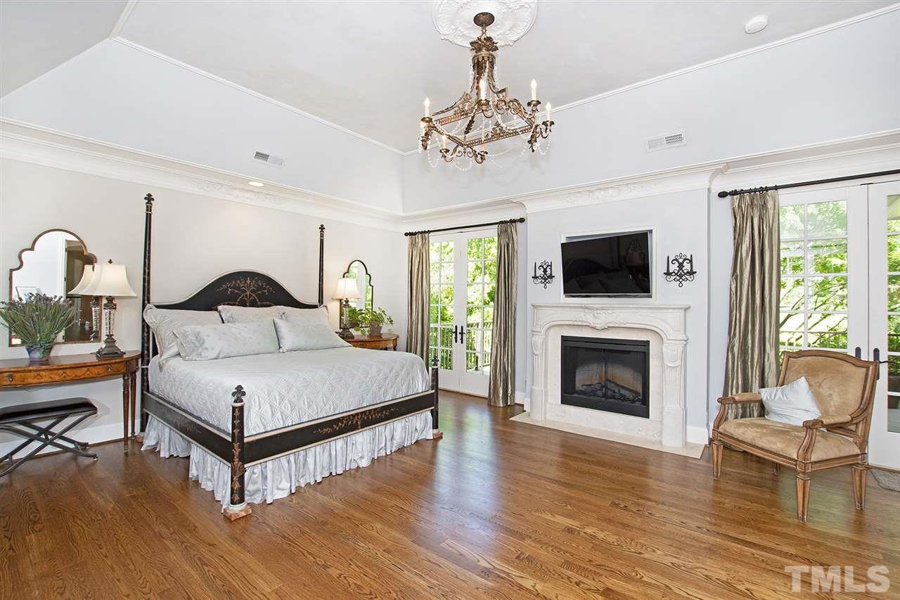 1016 Heydon Court Raleigh, NC 27614 - Photo 20 of 30 a living room with furniture fireplace and window