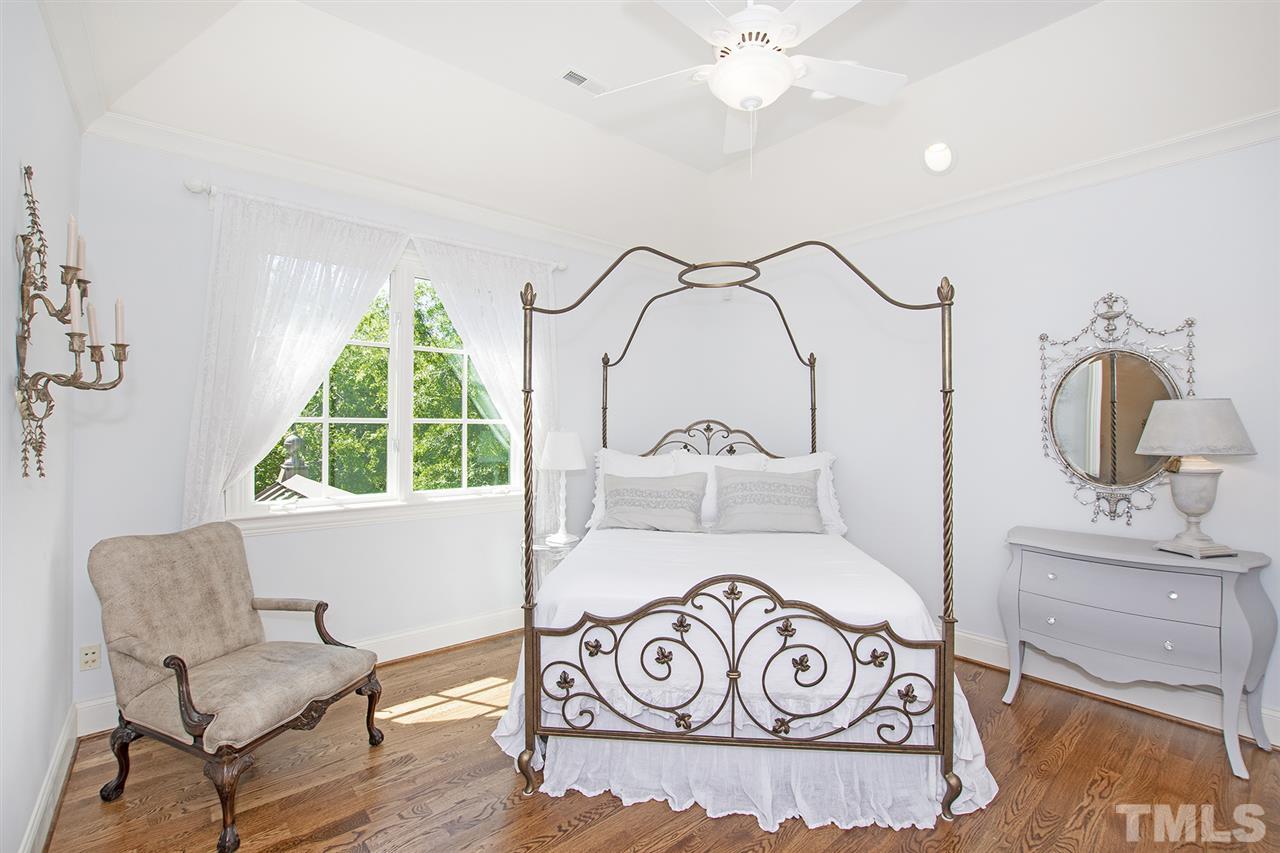 1016 Heydon Court Raleigh, NC 27614 - Photo 26 of 30 a bathroom with a sink and a mirror