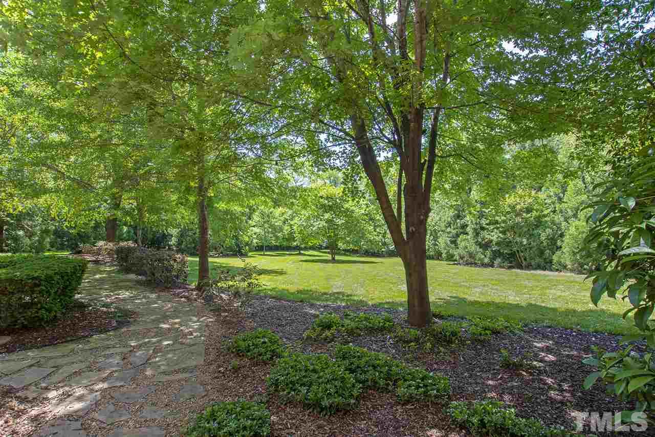 1016 Heydon Court Raleigh, NC 27614 - Photo 28 of 30 a view of a yard with a tree