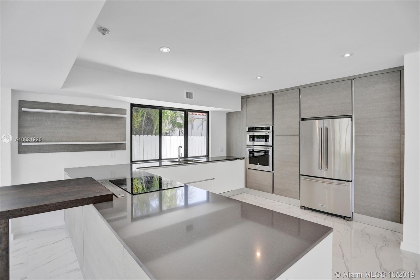 1375 Daytonia Road Miami Beach, FL 33141 - Photo 3 of 12 Designer Italian kitchen with custom made Cabinetry