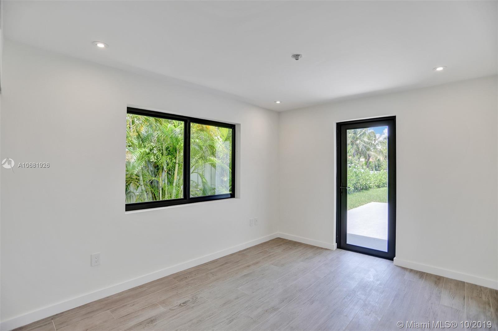 1375 Daytonia Road Miami Beach, FL 33141 - Photo 7 of 12 Bedroom with direct access to pool area