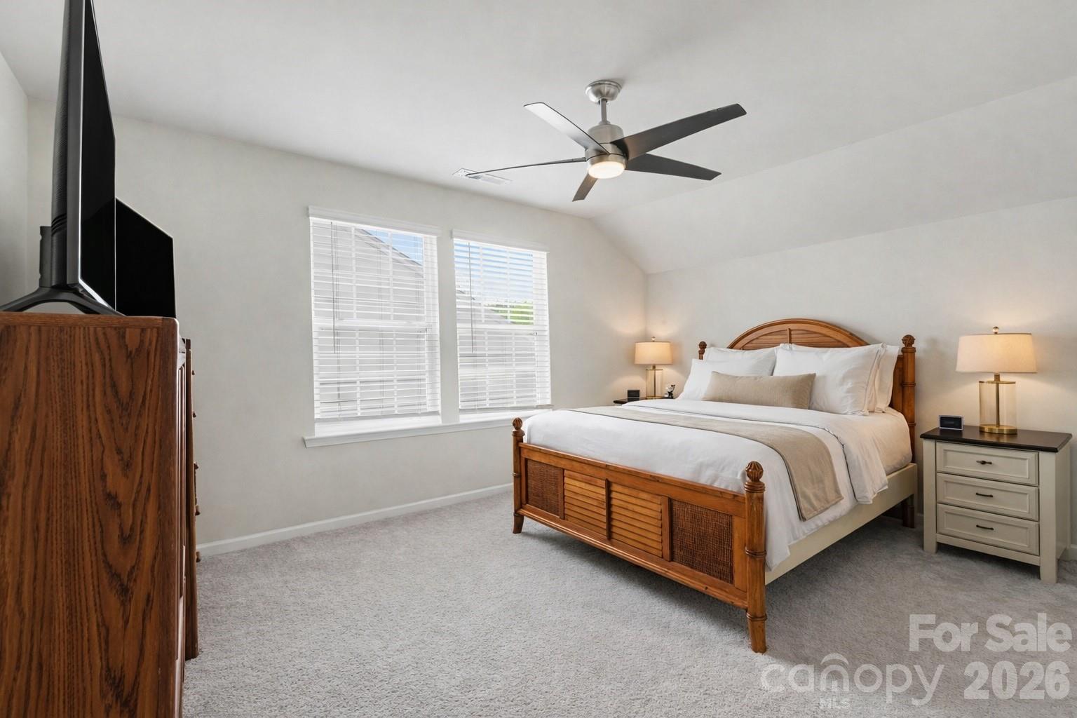 2971 Findley Road Statesville, NC 28625 - Photo 14 of 19 a bedroom with a bed lamp and window
