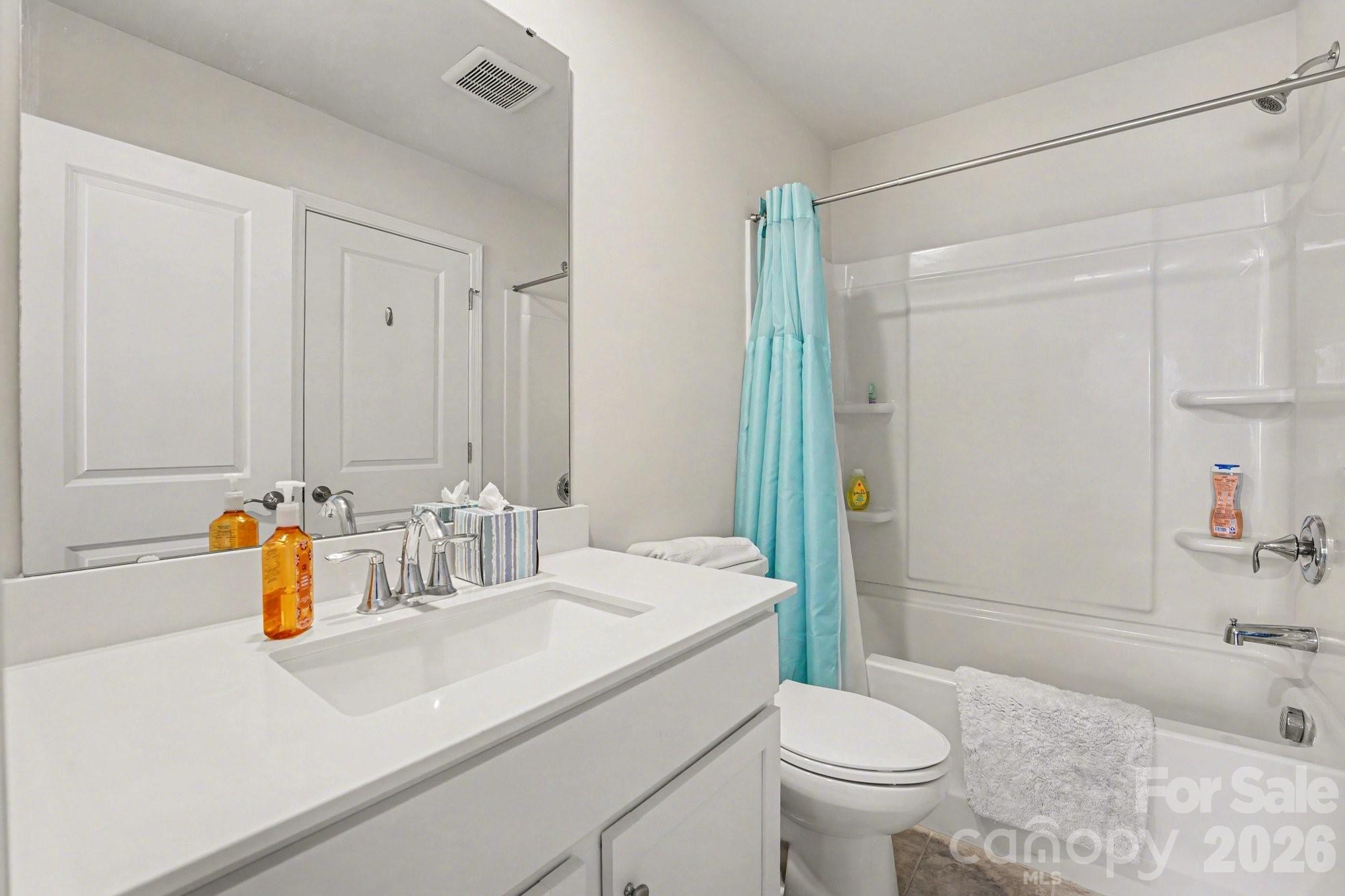 2971 Findley Road Statesville, NC 28625 - Photo 16 of 19 a bathroom with a sink a toilet and shower