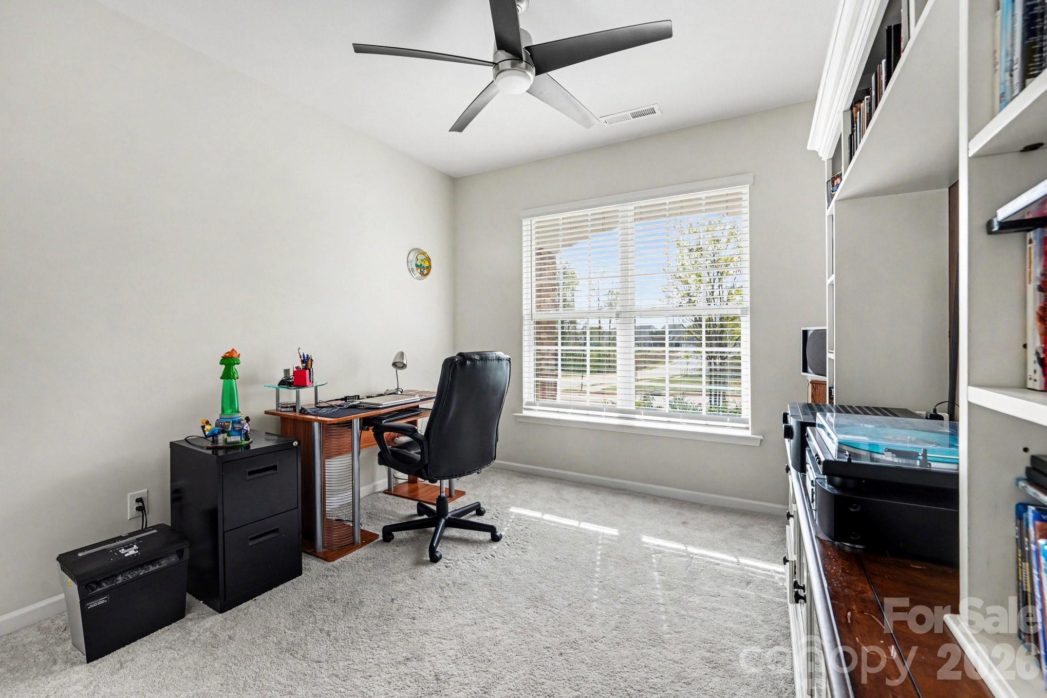 2971 Findley Road Statesville, NC 28625 - Photo 17 of 19 a view of a workspace with furniture and a window