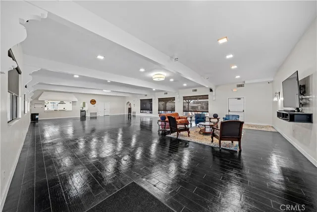 a view of a swimming pool with a patio