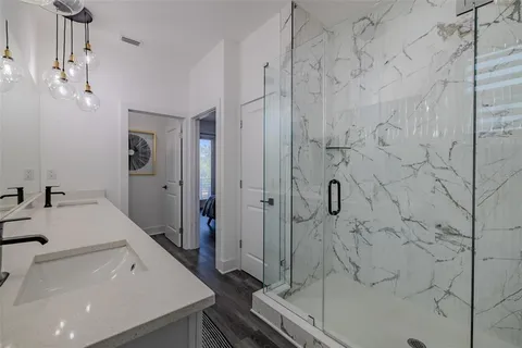 a view of a terrace with couches and sky view