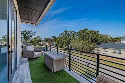 a backyard of a house with seating space