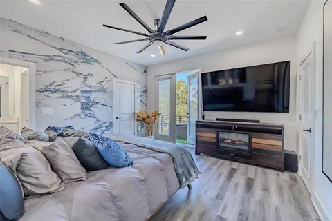 a view of an house with backyard space and garden