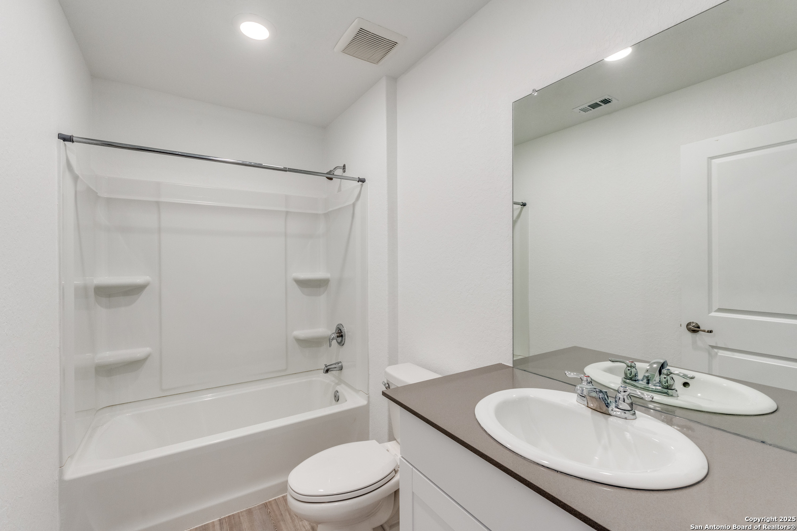 13503 Turnesa Terrace San Antonio, TX 78221 - Photo 15 of 25 a bathroom with a sink toilet and shower