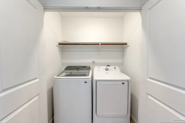 a utility room with dryer and washer