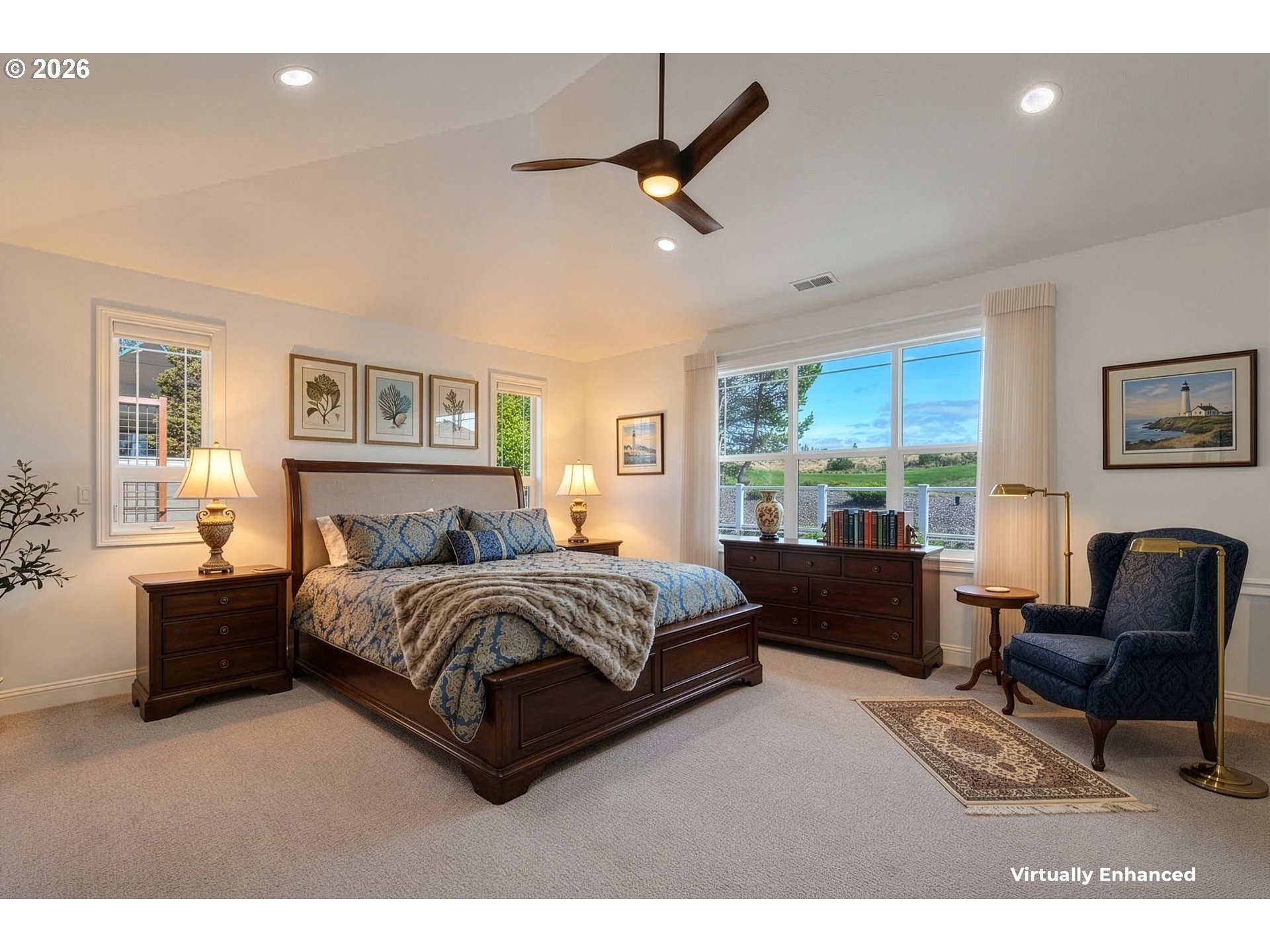 2116 Willow Loop East Florence, OR 97439 - Photo 16 of 47 a spacious bedroom with a bed and couch