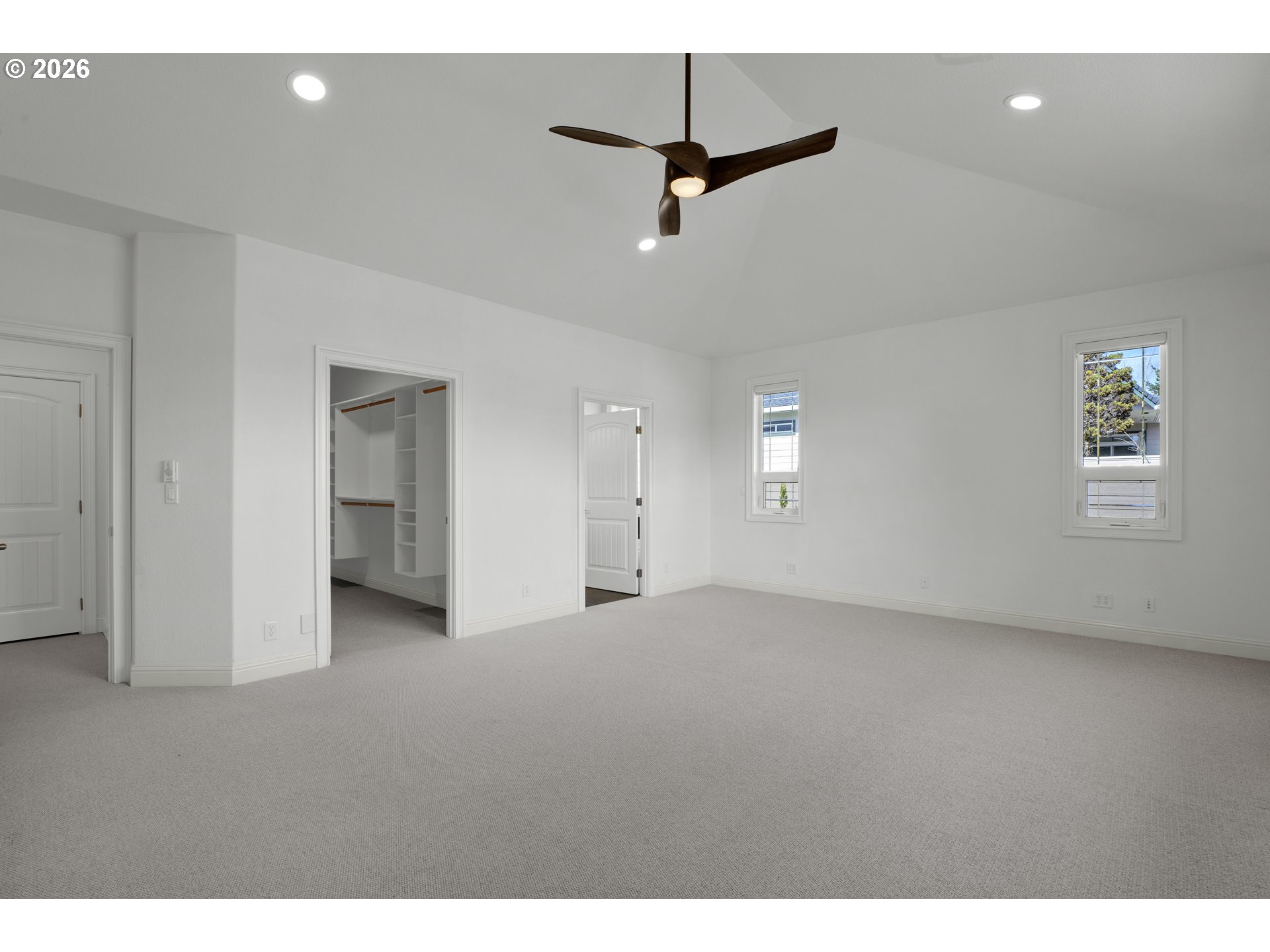 2116 Willow Loop East Florence, OR 97439 - Photo 18 of 47 a view of an empty room with a window