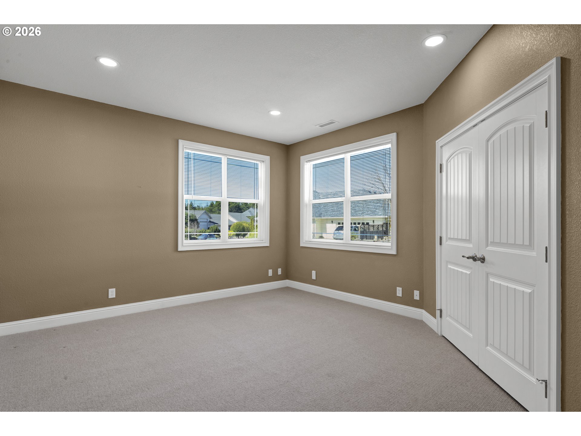 2116 Willow Loop East Florence, OR 97439 - Photo 24 of 47 a view of an empty room with a window