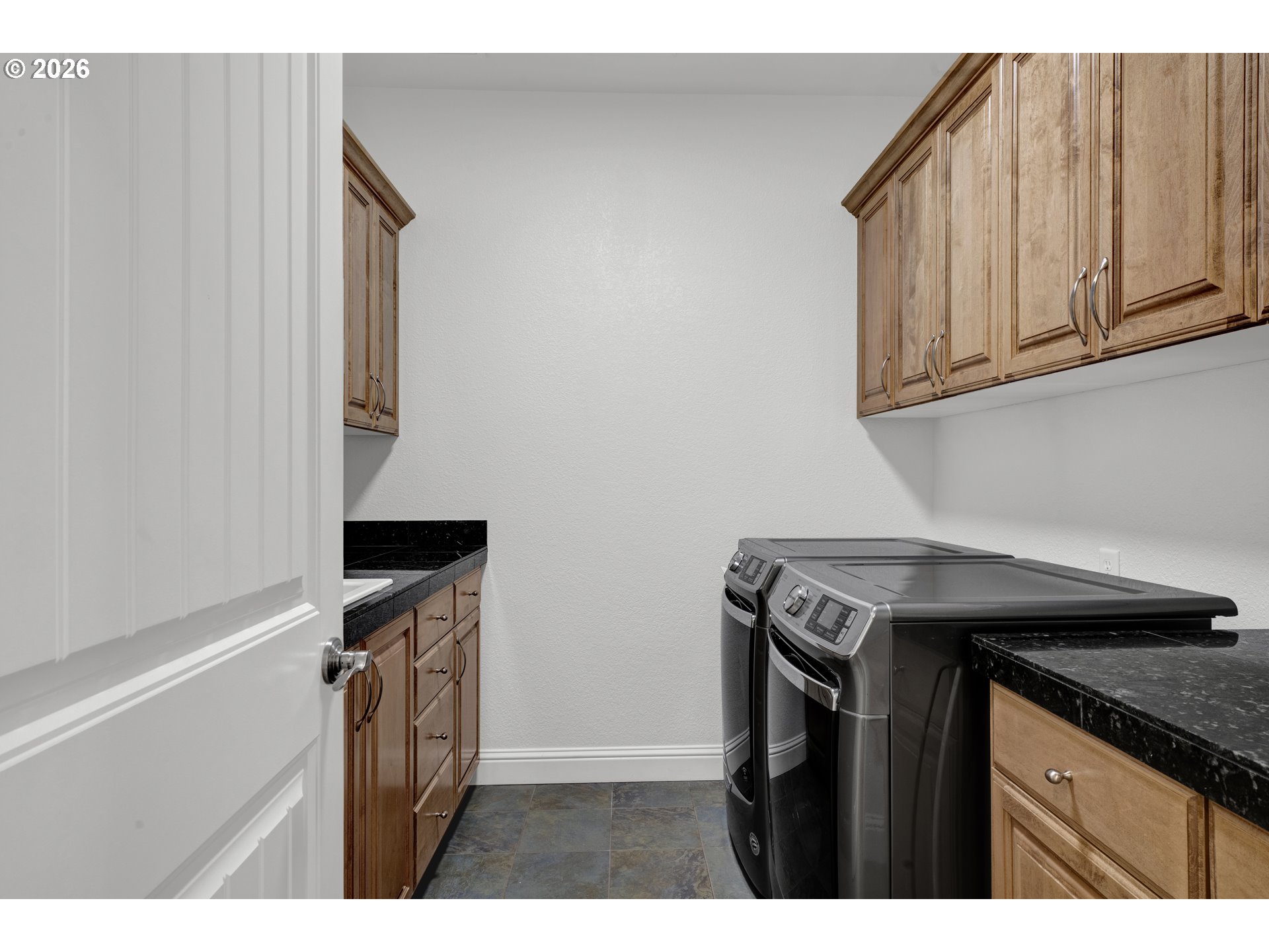 2116 Willow Loop East Florence, OR 97439 - Photo 29 of 47 a utility room with dryer and washer