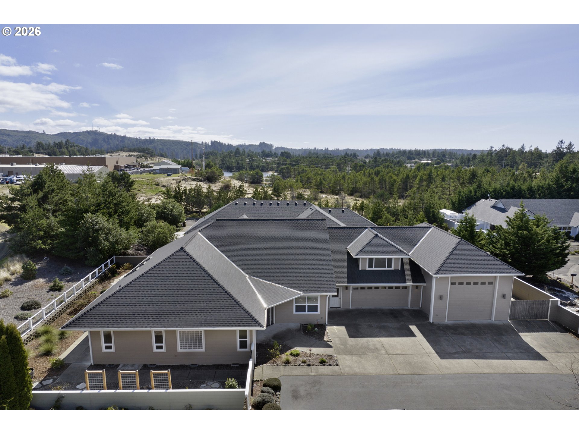 2116 Willow Loop East Florence, OR 97439 - Photo 3 of 47 an aerial view of residential houses with outdoor space
