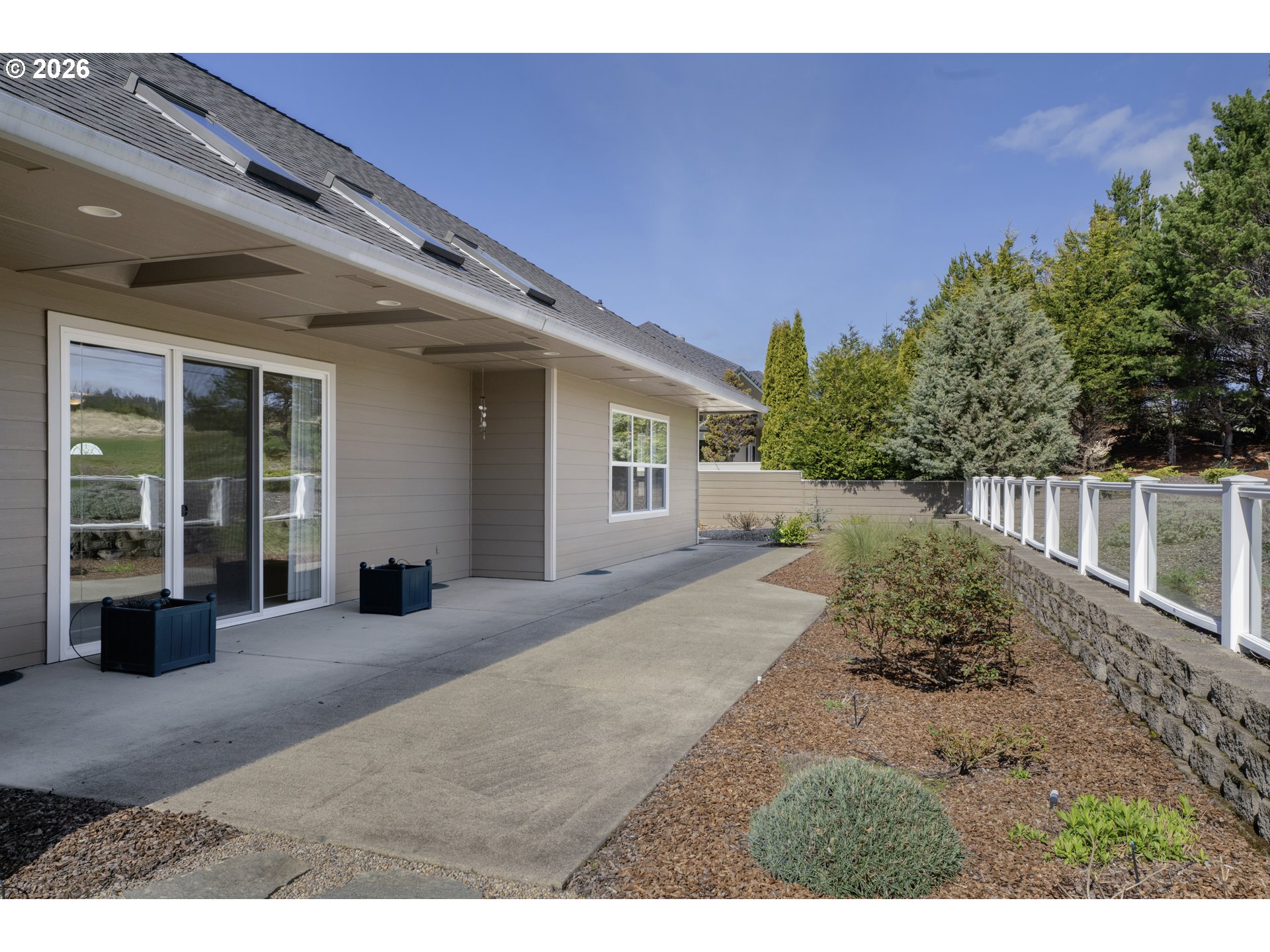 2116 Willow Loop East Florence, OR 97439 - Photo 37 of 47 a view of a house with a patio