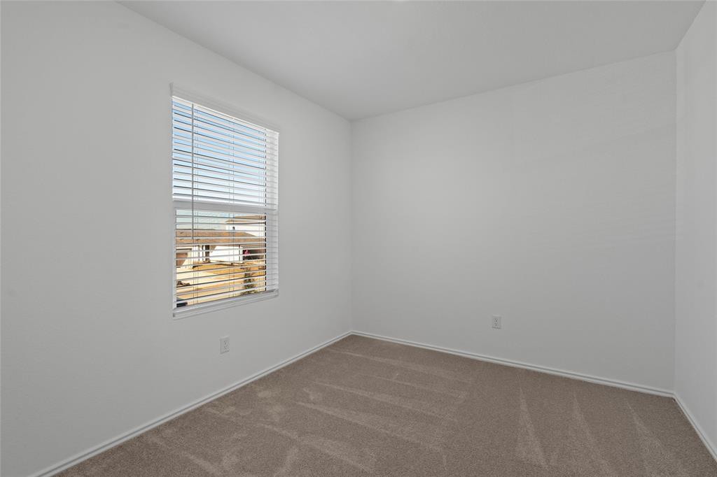 444 Marty Allen Loop Jarrell, TX 76537 - Photo 15 of 23 an empty room with a window