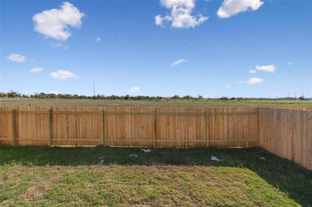 444 Marty Allen Loop Jarrell, TX 76537 - Photo 16 of 23 a view of a lake with houses in the back