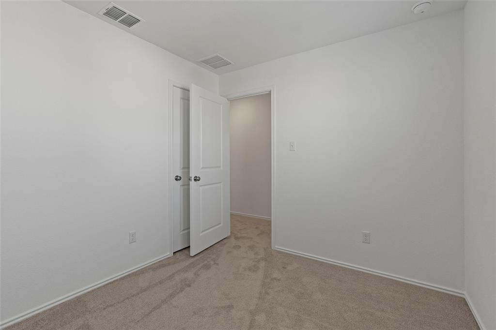 444 Marty Allen Loop Jarrell, TX 76537 - Photo 10 of 23 a view of an empty room