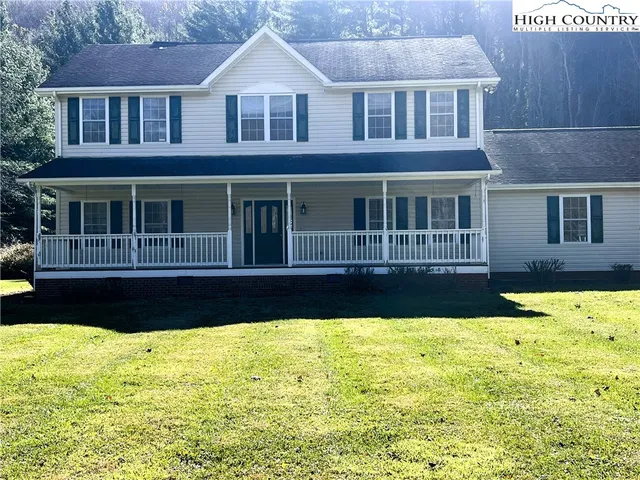 a front view of a house with swimming pool