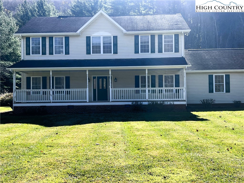 a front view of a house with swimming pool