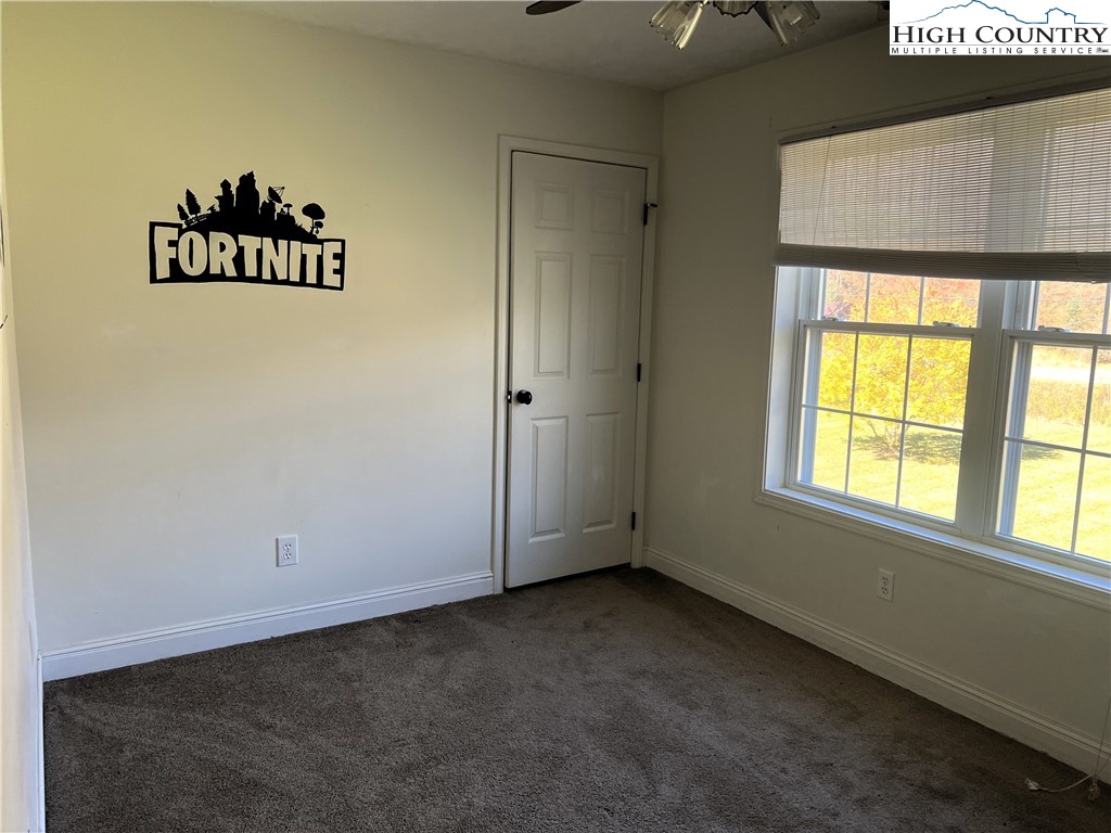 1371 West Buffalo Road West Jefferson, NC 28694 - Photo 21 of 31 a view of an empty room with a window
