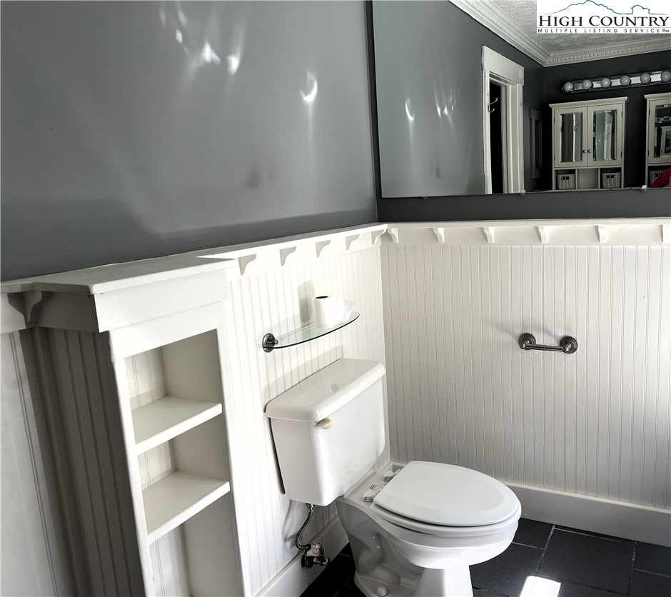 1371 West Buffalo Road West Jefferson, NC 28694 - Photo 24 of 31 a bathroom with a toilet a sink and shower