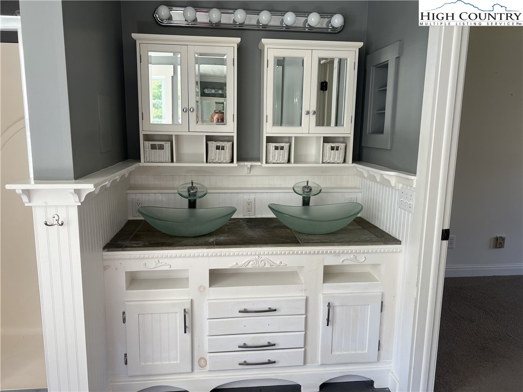 1371 West Buffalo Road West Jefferson, NC 28694 - Photo 26 of 31 a kitchen with a sink and cabinets