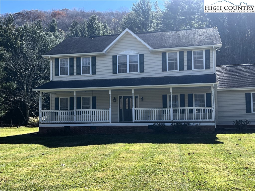 1371 West Buffalo Road West Jefferson, NC 28694 - Photo 29 of 31 a front view of a house with swimming pool