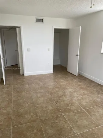 $2,000 | 8255 Lake Drive, Unit 401, Doral, FL 33166