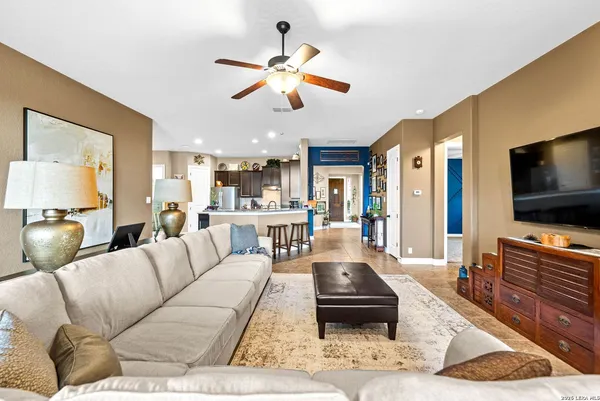 a kitchen with granite countertop stainless steel appliances and wooden cabinets