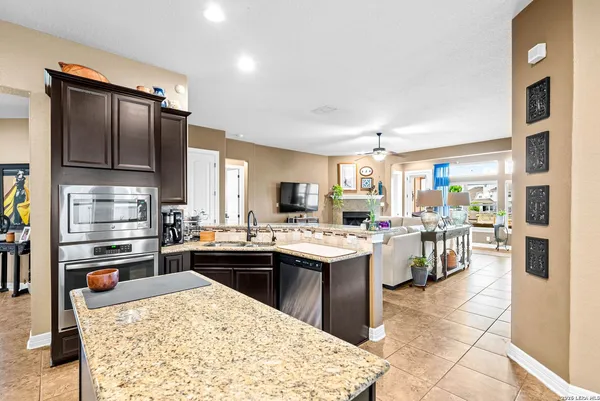 a view of a dining room with furniture and window