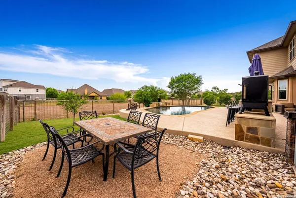 a view of a kitchen with a sink and a stove