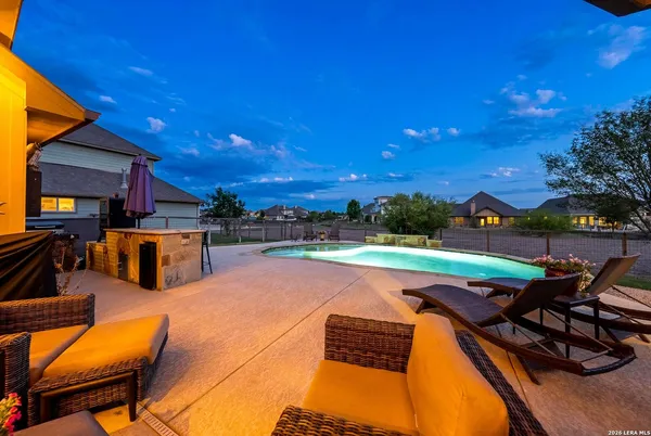 a view of a park with large trees