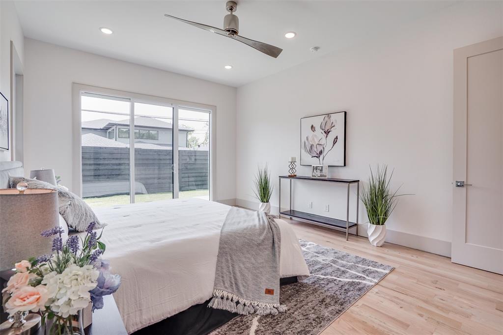3732 Valley Ridge Road Dallas, TX 75220 - Photo 17 of 35 Bedroom featuring light wood-style flooring, a ceiling fan, recessed lighting, and access to outside