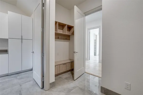 a view of a hallway with closet